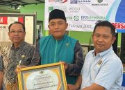 PWI Sidoarjo Gelar Bakti Sosial Bareng Baznas: Pemeriksaan Kesehatan dan Pembagian Sembako di Wonocolo