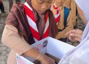 Ratusan Siswa MI Darul Hikmah Prasung Buduran Galang Dana untuk Korban Bencana Sumatra